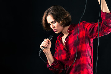 Model Red Flannel Shirt Singing Into Mic