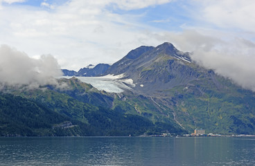 Glacier above a Coastal Town