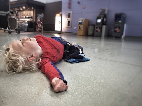 Boy waiting at the airport