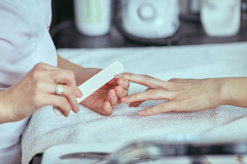 Women's manicure, nail file, hand care