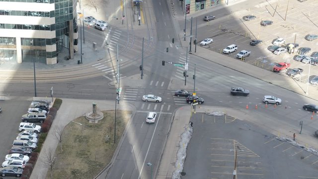 Timelapse traffic at intersection in urban setting