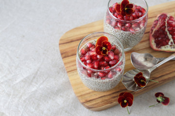 Chia seeds pudding with pomegranate, selective focus