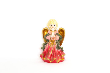 Figurine of angel on white background