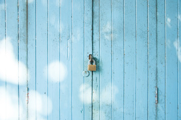 Blue grunge door was locked by locker
