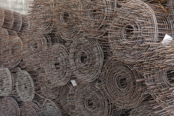 Rolls of wire mesh placed them in storage awaiting disposal.