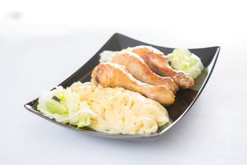 fried chicken and macaroni on a plate