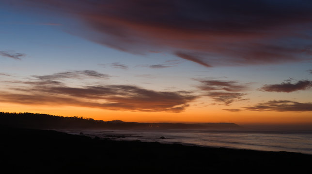 Pacific Coast Sunrise Dramatic Saturated Orange Hues Over Ocean