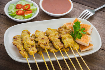 Grilled pork satay with peanut sauce and toast, Thai food