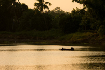 Sunset view with orange filter on 'Thachin's River', Thailand.