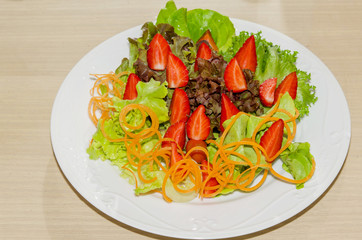 Vegetable salad and strawberry