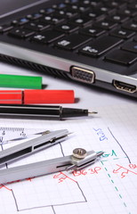 Obraz premium Electrical diagrams, accessories for drawing and laptop