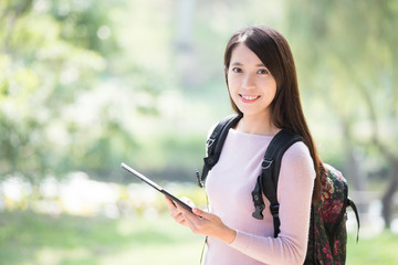woman student with digital tablet