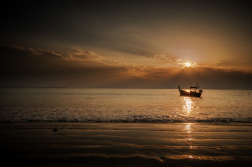 Ray of sunset above fisherman boat from Khao Lak Phang Nga Province, Thailand