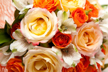 Bright bouquet of orange roses