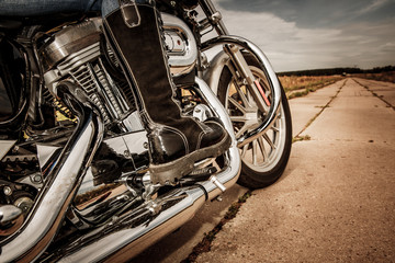 Biker girl riding on a motorcycle