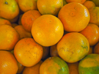 freshness oranges group in market on background