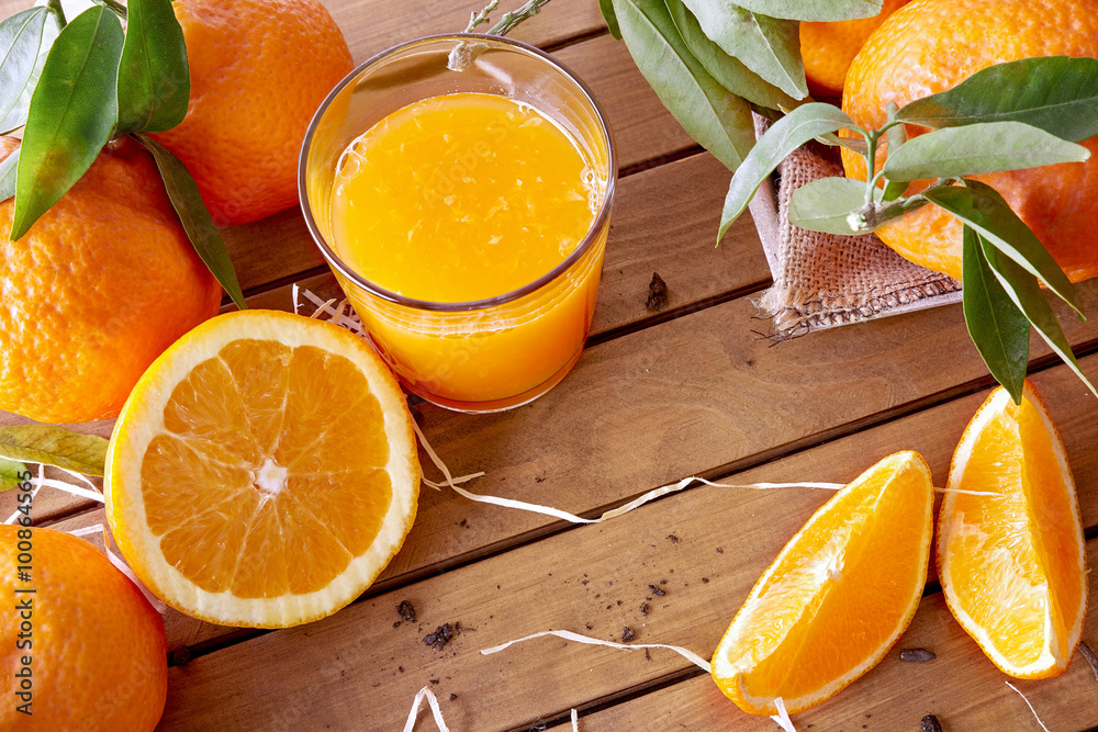 Sticker Orange juice on a wooden table top