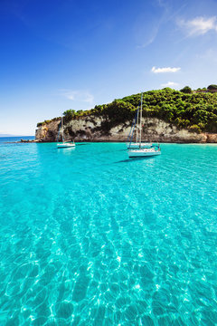 Fototapeta Sailboats in a beautiful bay, Greece