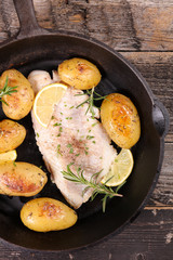 fish fillet and roasted potatoes