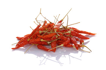 Fototapeta premium Dried red hot peppers, chilli isolated on white background