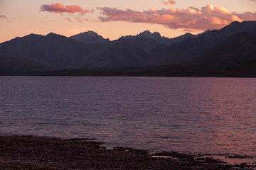 Red clouds over a mountain lake. Ridge Suntar-Hayata. Yakutia. Russia.
