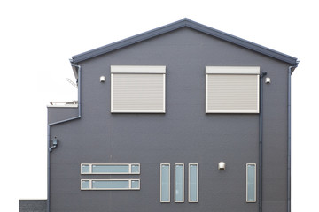 Detail of house exterior wall and window..