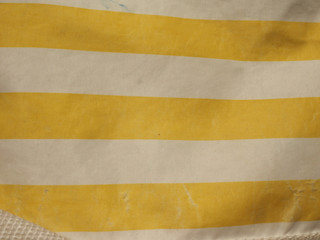 Yellow and white striped fabric