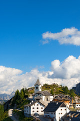 Fototapeta na wymiar Monte Santo di Lussari - Tarvisio Italy / Village of Monte Lussari (1790 m) in the Italian Alps. Tarvisio, Friuli Venezia Giulia, Italy