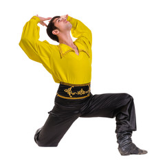 Naklejka premium Dancing man wearing a toreador costume. Isolated on white in full length.