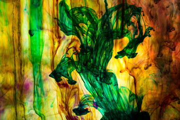 Acrylic colors and ink in water. Abstract background.