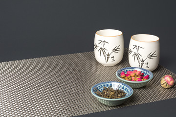 flower tea in glasses arranged  on an table set.