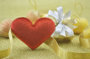 Fabric red heart shape with gift box on gold background, Love co