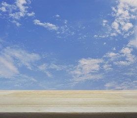 Empty wooden table and blue sky for your product display montage