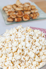 pop-corn and salty snacks on a table