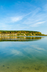 Fototapeta na wymiar autumn landscape with lake and forest