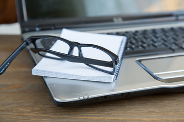 Office supplies  at wooden table