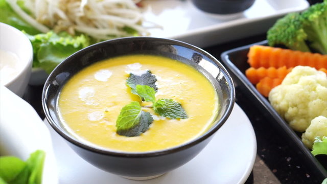Pumpkin Soup arrange on wooden table meal with other healthy vegetable food