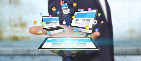 Businessman holding tech device in his hand