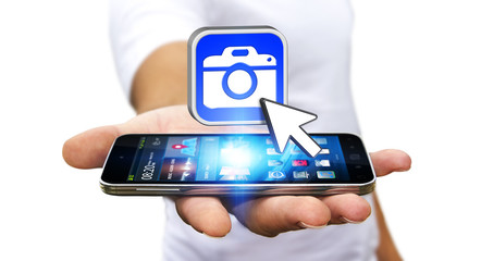 Young man using modern camera application