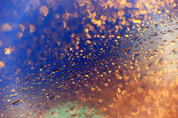 background blur night lights through the glass