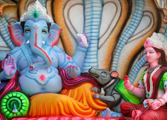 Fototapeta premium Closeup of Indian Hindu God Ganesha Idol for sale in the market