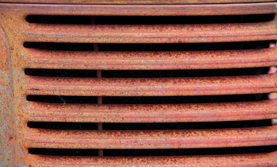 Rusty old truck grill background