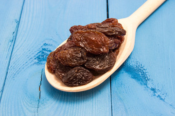 the raisins on a blue board