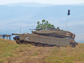Fototapeta premium Merkava tanks and Israeli soldiers in training armored forces