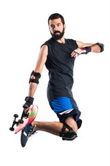 Man with skateboard jumping