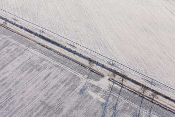 aerial view  over the harvest fields in winter