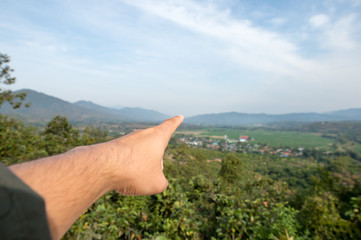 Pointing to the mountain