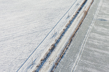 aerial view  over the harvest fields in winter