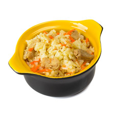Cup with pilaf on a white background.