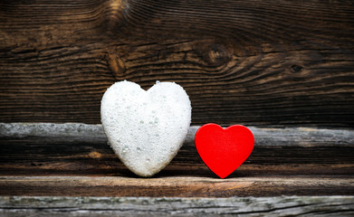 White Heart With Drops Of Rain And Red Wooden Heart On Old Wooden Board. Love Concept.
